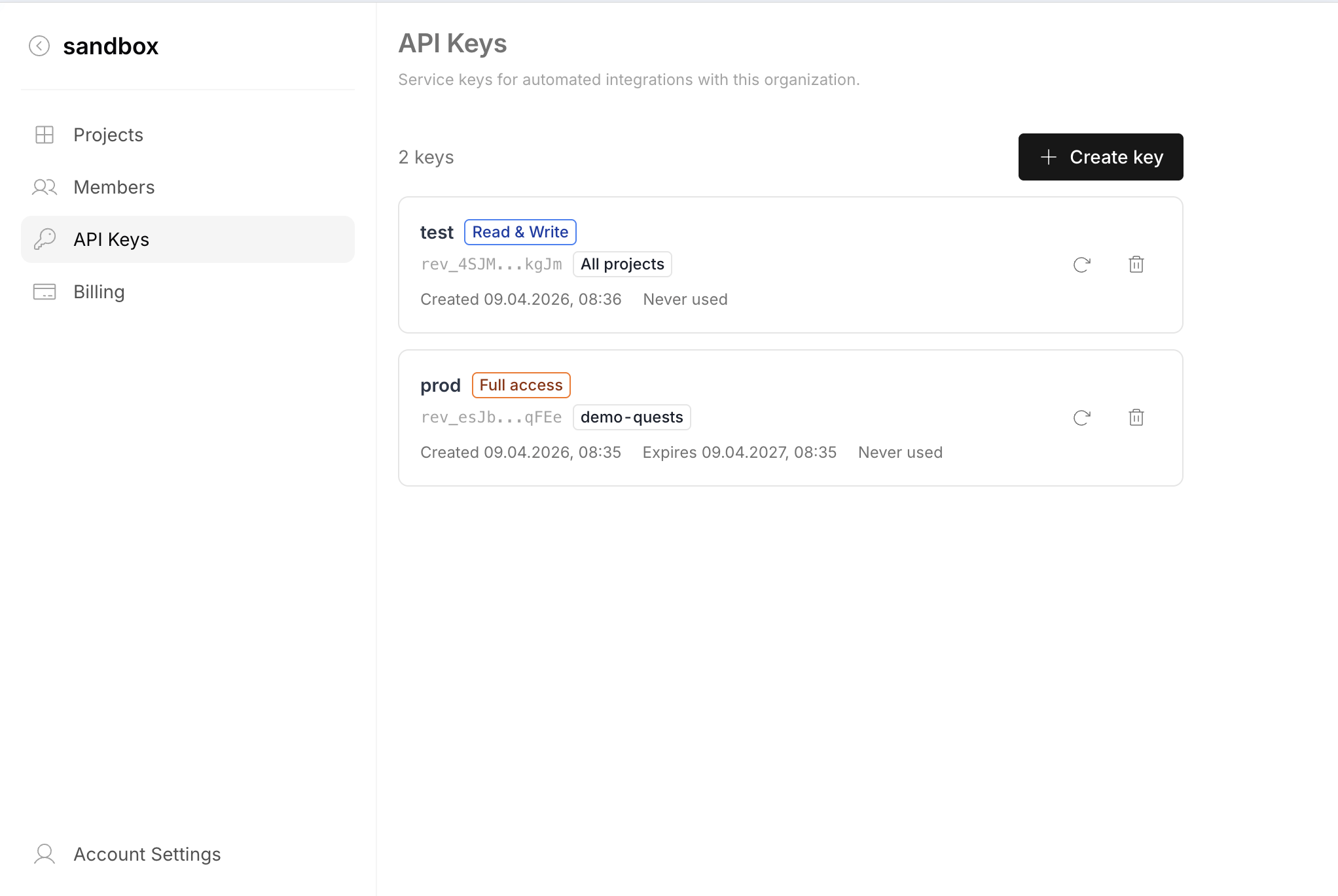 Organization Settings — API Keys page with service keys showing name, access level, scope, and rotate/delete actions